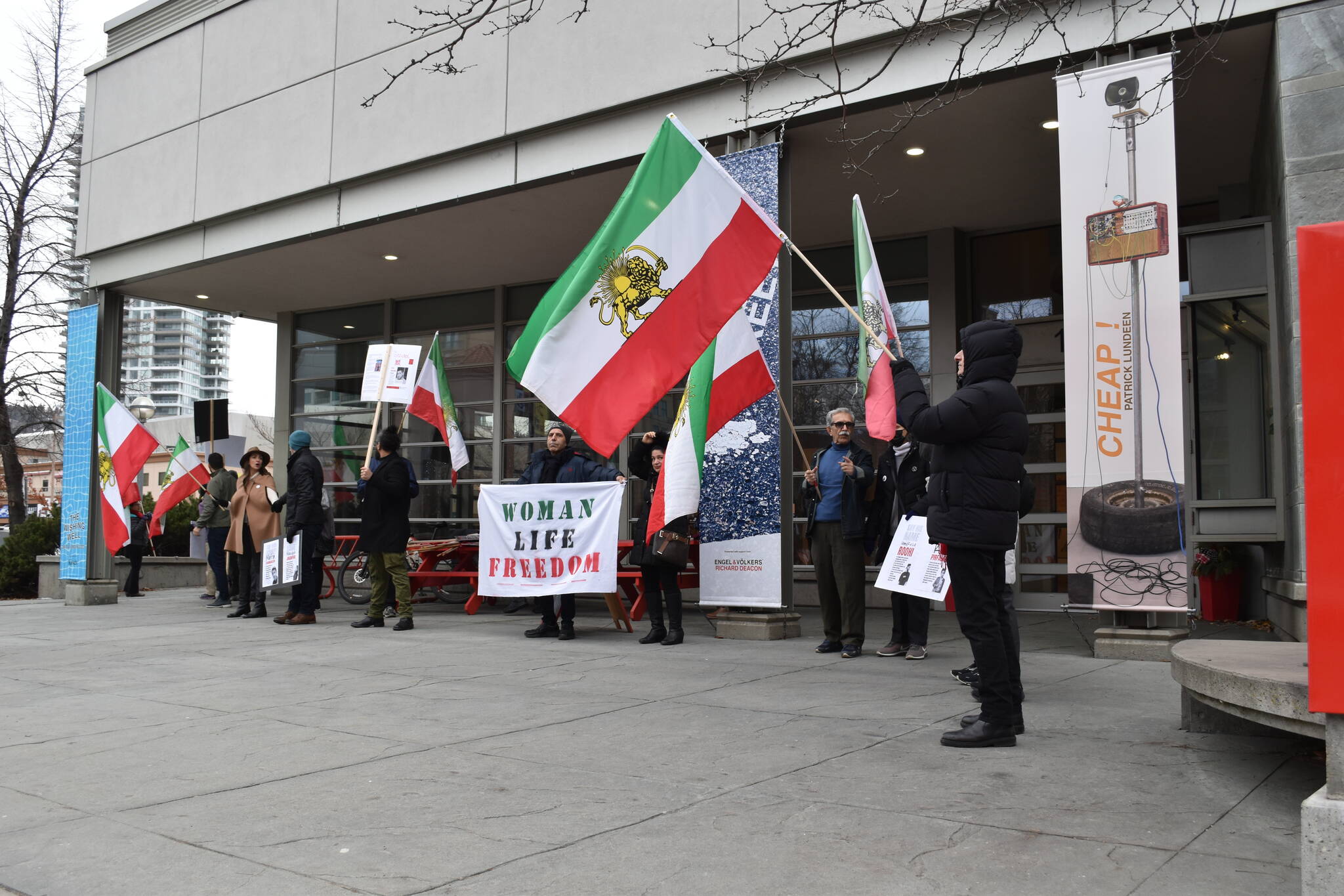A 'human-chain' protest took place in front of the Kelowna Art Gallery in support of the Iran Revolution on Saturday. (Jordy Cunningham/Capital News)