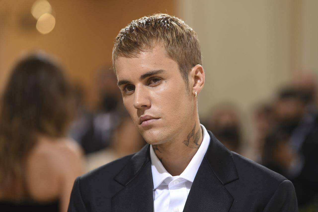 FILE - Justin Bieber attends The Metropolitan Museum of Art’s Costume Institute benefit gala on Sept. 13, 2021, in New York. Bieber’s publishing rights, copyright ownership and all rights to his entire music catalog are now under Hipgnois. The deal reportedly cost $200 million which is one of the biggest sales for a musician as young as Bieber, who is 28 years old. (Photo by Evan Agostini/Invision/AP, File)