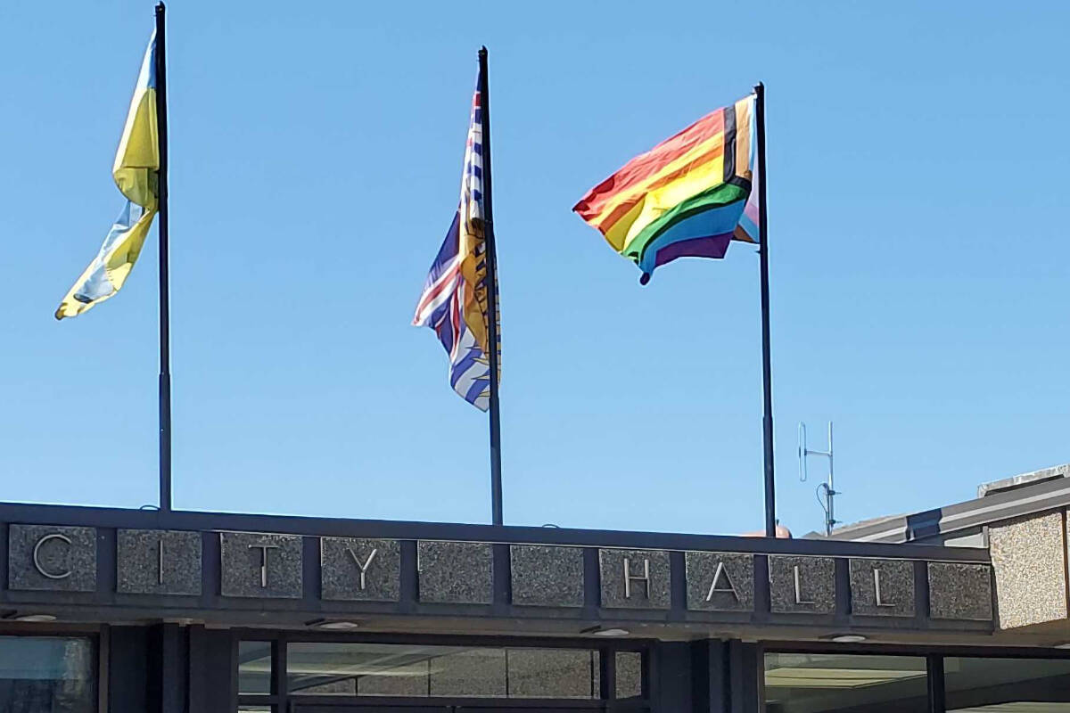 The pride flag (right) was raised at Vernon City Hall Monday, Aug. 8, 2022 to kick off pride week events in the city. The city is developing a flag policy and will install a new single-raising flag pole somewhere on the Civic Plaza grounds in 2023. (Morning Star - file photo)