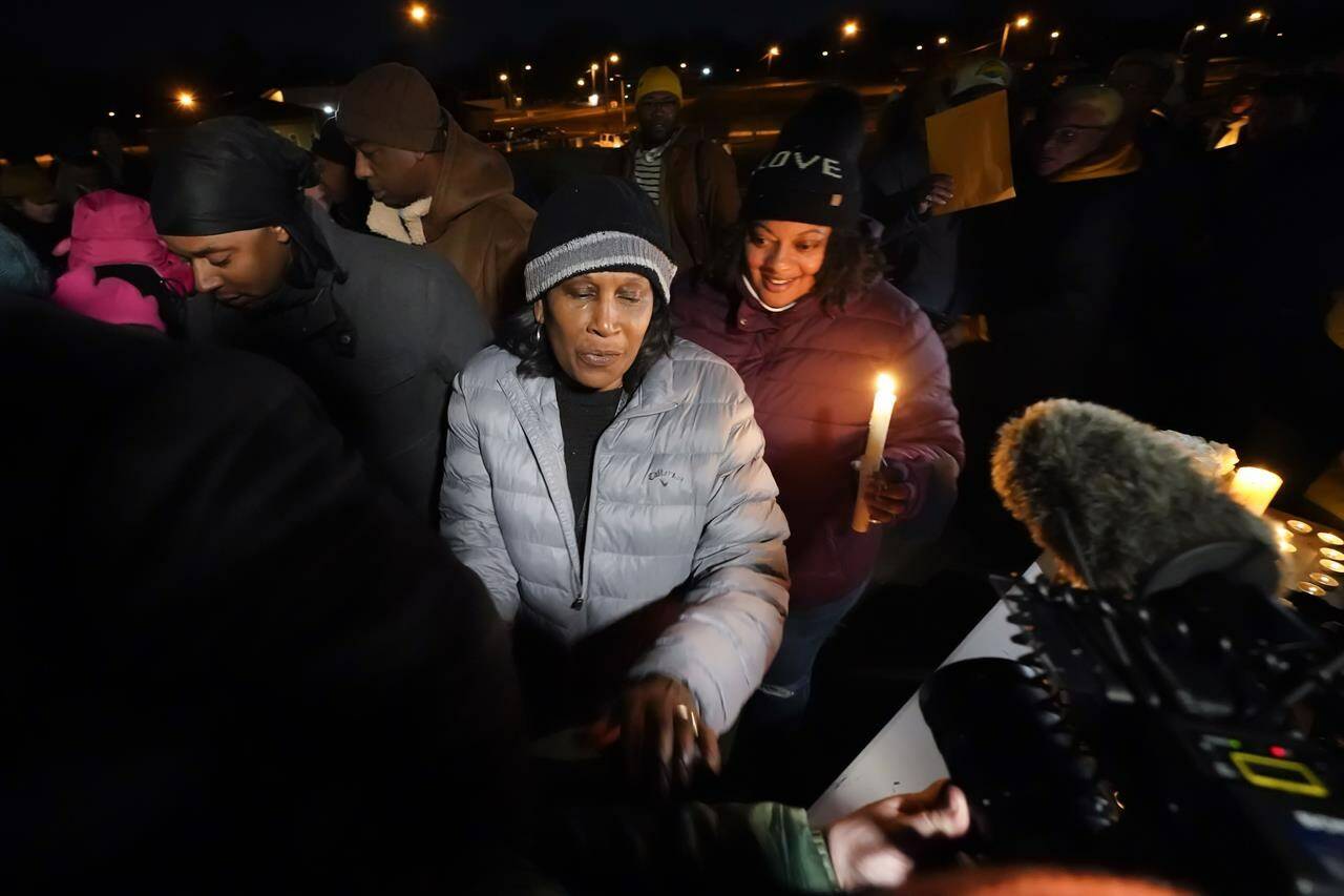 RowVaughn Wells, mother of Tyre Nichols, who died after being beaten by Memphis police officers, leaves at the conclusion of a candlelight vigil for Tyre, in Memphis, Tenn., Thursday, Jan. 26, 2023. The family is calling for calm across the United States as the country braces for visceral video evidence of another young Black man dying at the hands of police. THE CANADIAN PRESS/AP-Gerald Herbert