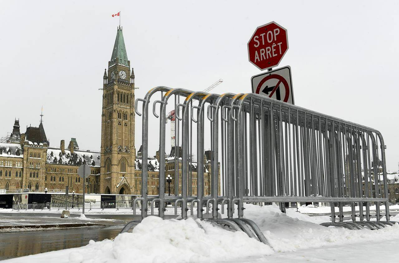 Fencing is seen on Parliament Hill in Ottawa, one year after the Freedom Convoy protests took place, on Friday, Jan. 27, 2023. The Parliamentary Protective Service expects 500 people to gather this weekend to mark a year since the “Freedom Convoy” occupied downtown Ottawa. THE CANADIAN PRESS/Justin Tang