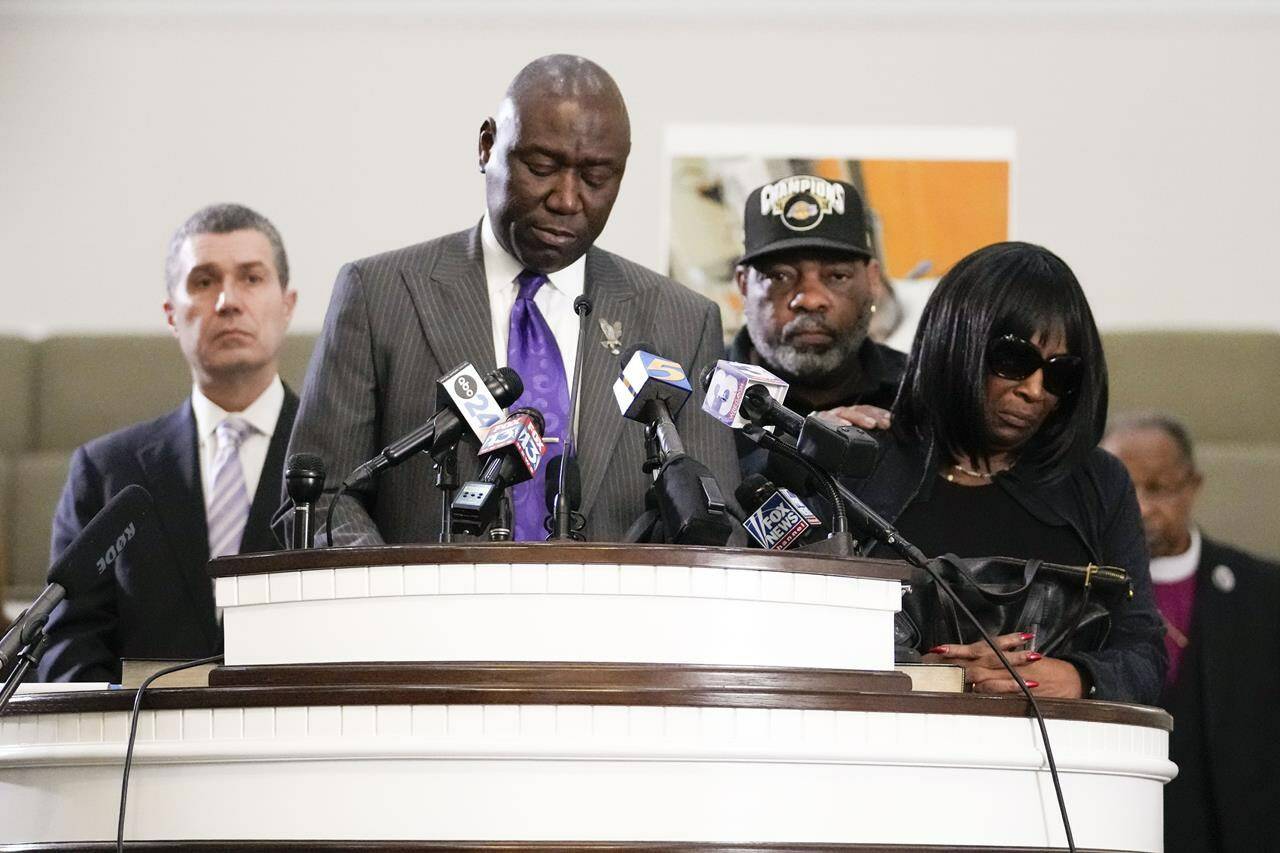 Civil rights attorney Ben Crump speaks at a news conference with the family of Tyre Nichols, who died after being beaten by Memphis police officers, as RowVaughn Wells, mother of Tyre, right, and Tyre’s stepfather Rodney Wells, along with attorney Tony Romanucci, left, also stand with Crump, in Memphis, Tenn., Monday, Jan. 23, 2023. (AP Photo/Gerald Herbert)