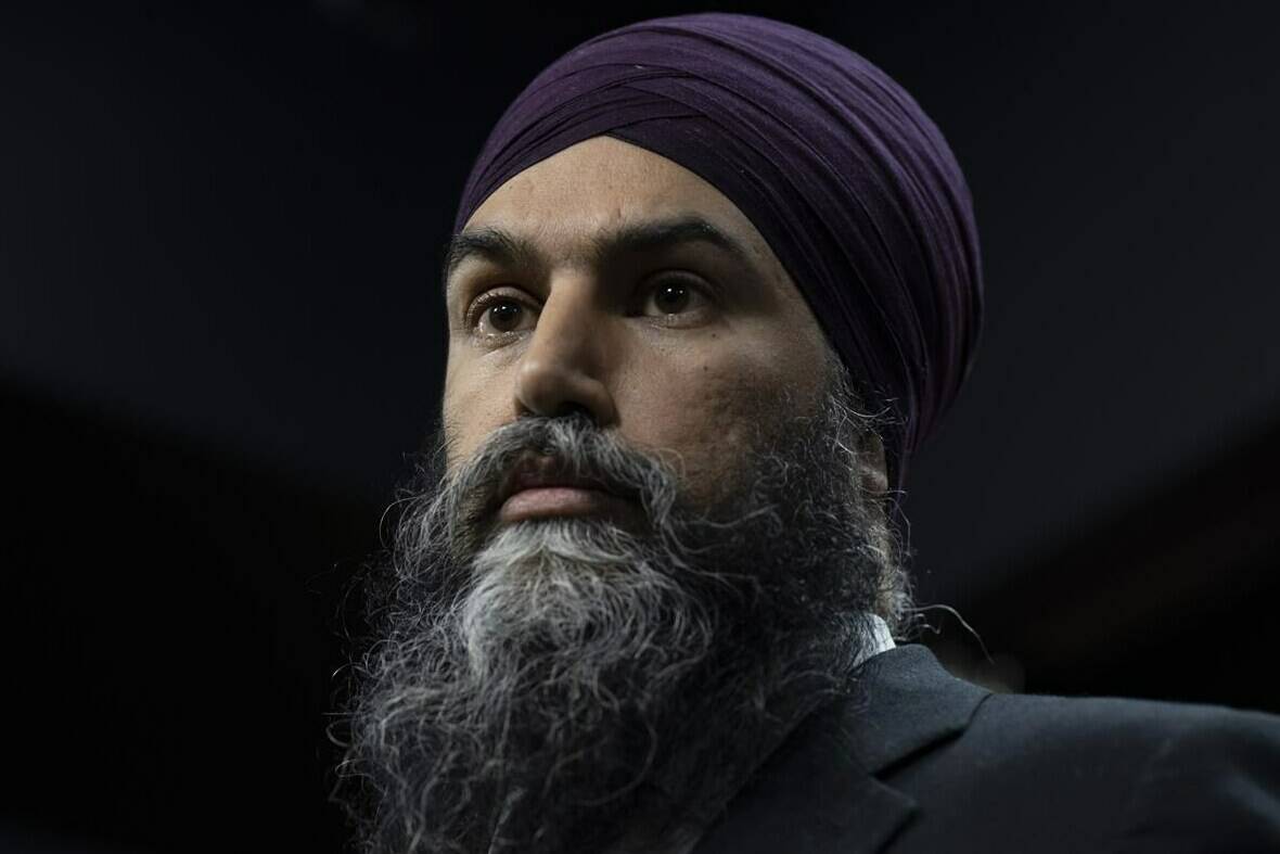 New Democratic Party leader Jagmeet Singh listens to a question during an availability on Parliament Hill, Thursday, January 19, 2023 in Ottawa. Singh says he will call on the House of a Commons to hold an emergency debate on the privatization of health care. THE CANADIAN PRESS/Adrian Wyld