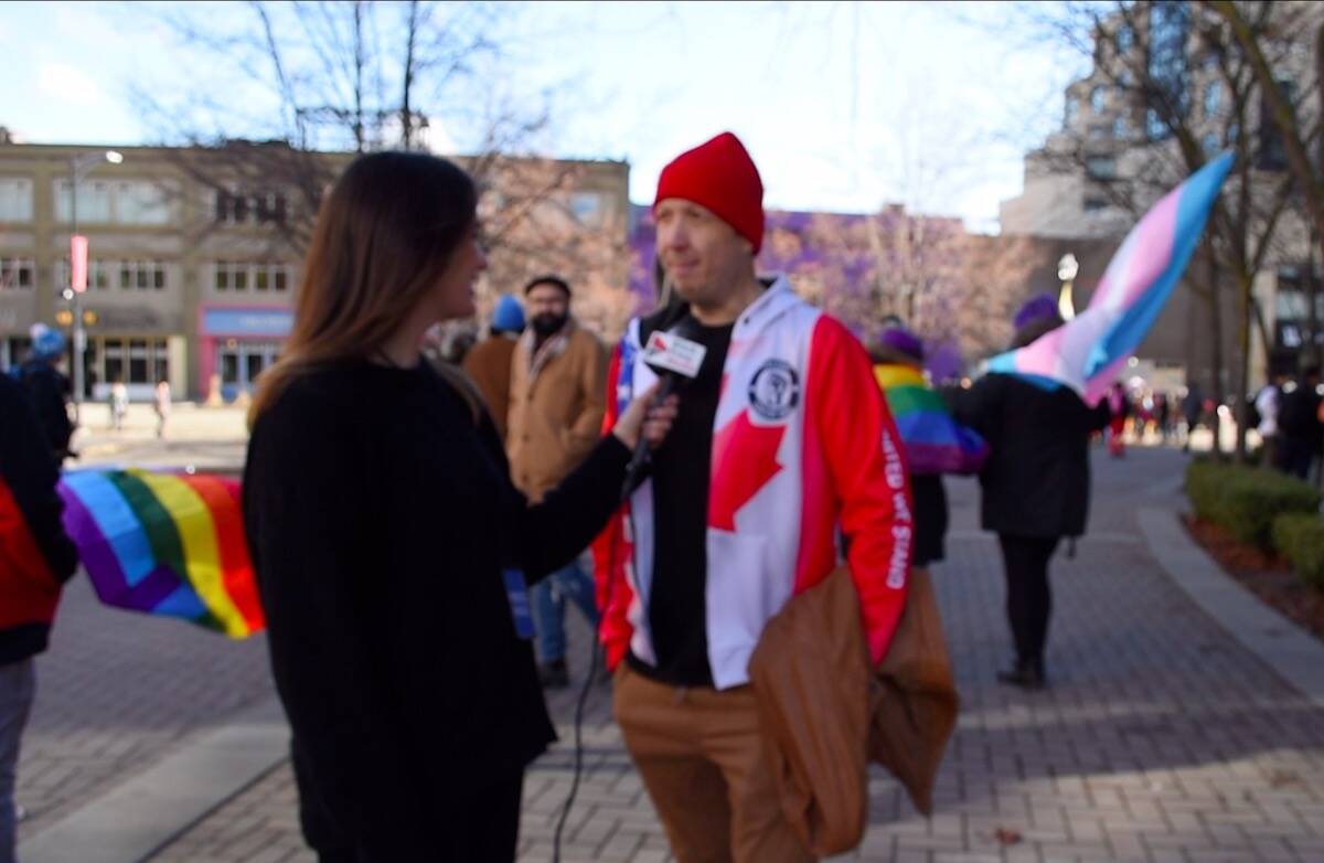 Reporter Jacqueline Gelineau interviewing Feedom Fighter and LGBTQIA+ ally Robin Boostrom. (Jacqueline Gelineau/Capital News)