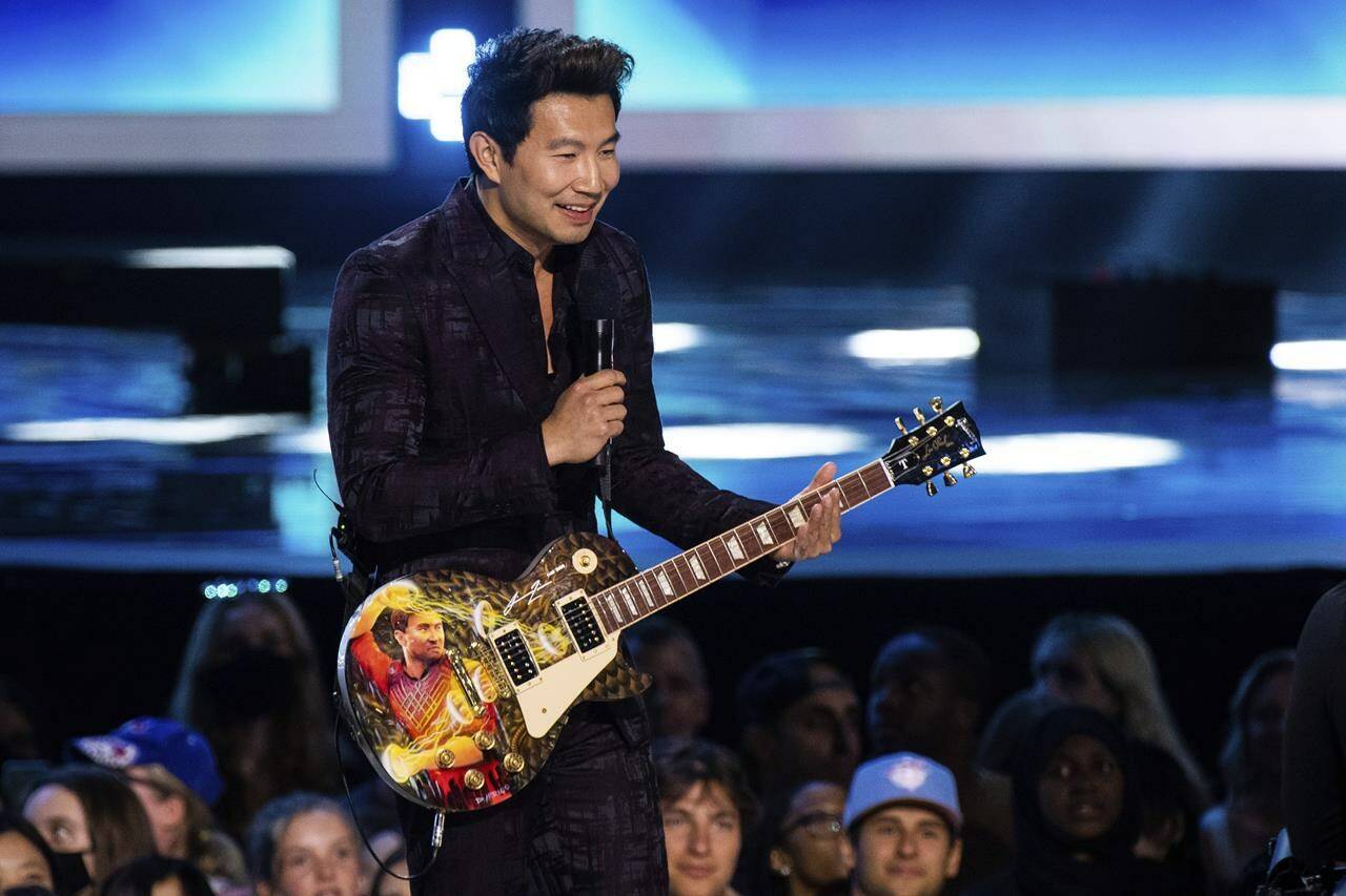 Simu Liu appears on stage at the JUNO Awards on Sunday, May 15, 2022, at the Budweiser Stage in Toronto. THE CANADIAN PRESS/Arthur Mola-Invision-AP