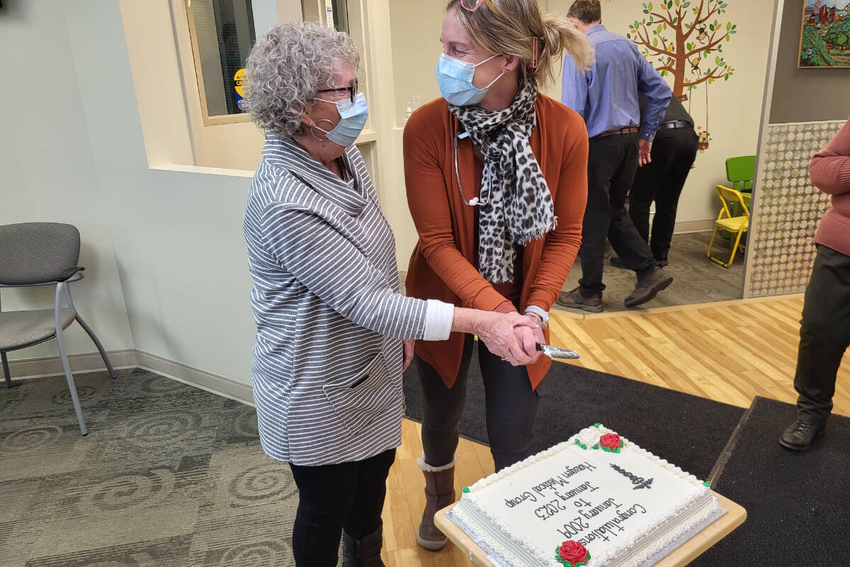 Armstrong Spallumcheen Haugen Community Healthcare Society president Sandra Borden (left) joins Dr. Kira McClellan in celebrating 14 years of operating the Haugen Medical Group office on Smith Drive Tuesday, Jan. 31. While smiles abounded at the celebration, the society is facing some financial concerns, and is looking for support from the communities of Armstrong and Spallumcheen. (Roger Knox - Morning Star)