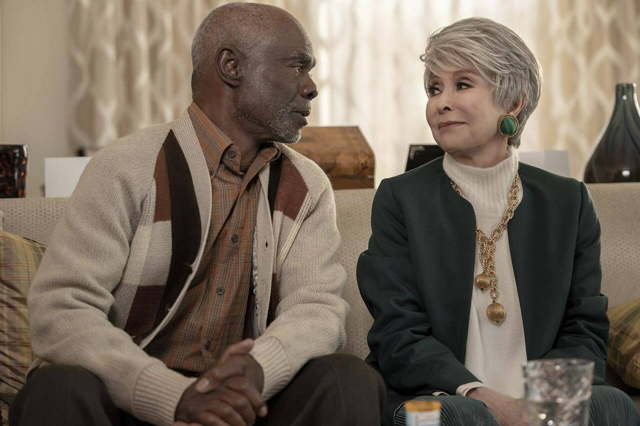 This image released by Paramount shows Glynn Turman, left, and Rita Moreno in a scene from “80 for Brady.” (Scott Garfield/Paramount Pictures via AP)
