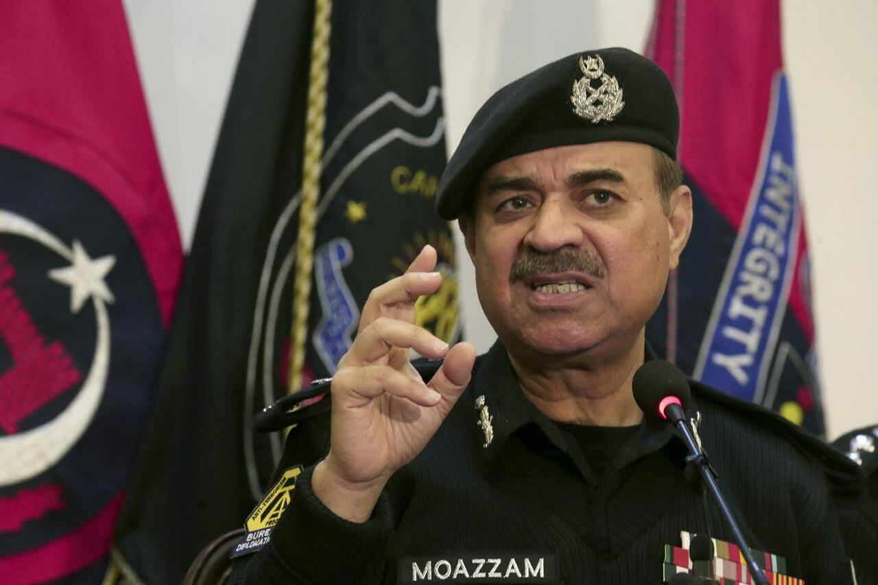 Pakistan's Khyber Pakhtunkhwa provincial police chief Moazzam Jan Ansari speaks during a press conference regarding the investigation of Monday's suicide bombing in Peshawar, Pakistan, Feb. 2, 2023. A suicide bomber who killed 101 people at a mosque in northwest Pakistan this week had disguised himself in a police uniform and did not raise suspicion among guards, the provincial police chief said on Thursday. (AP Photo/Muhammad Sajjad)