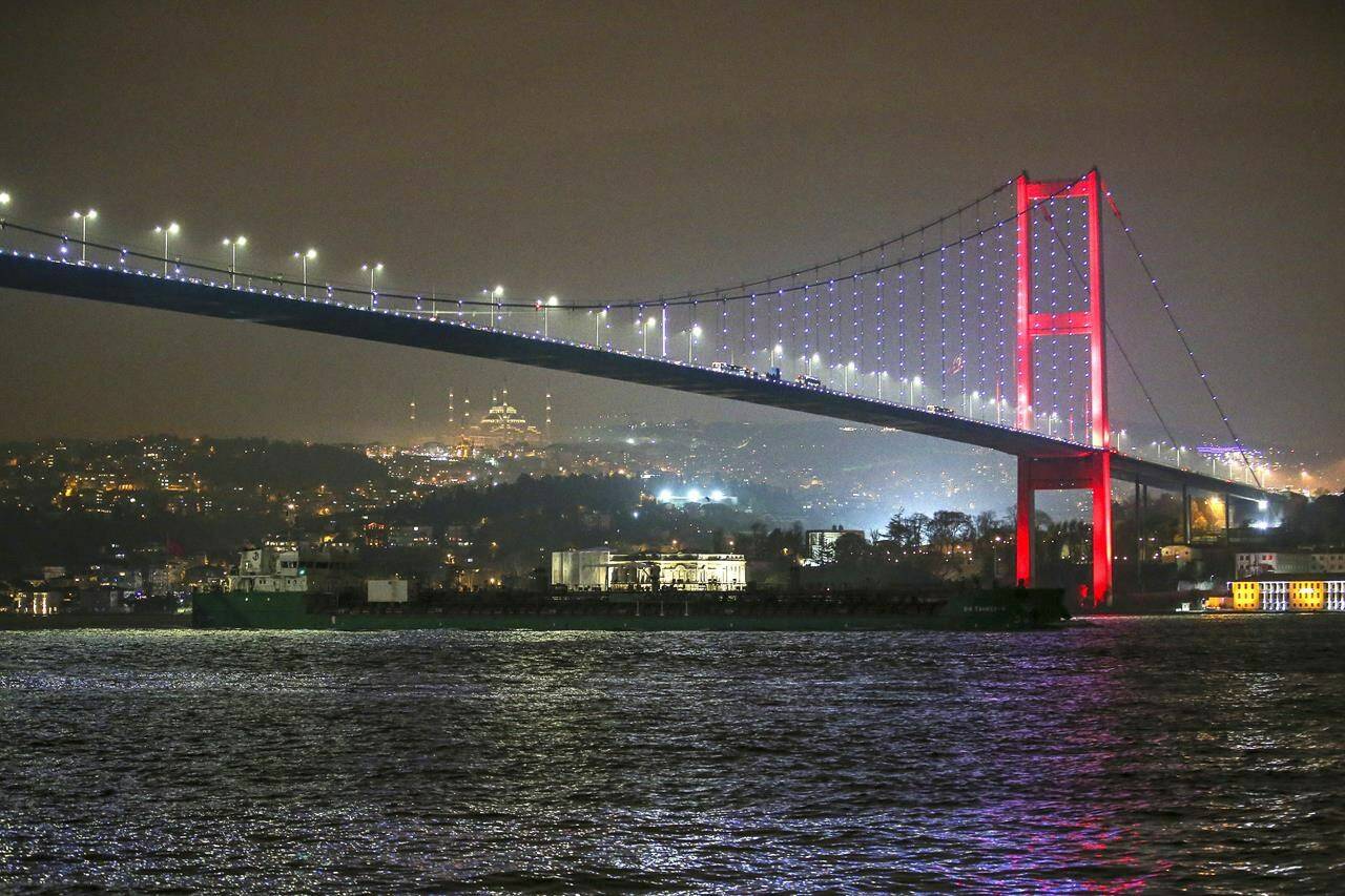 VF Tanker 9 oil tanker ship, which departed from Russian Temryuk port on December 12, sails under the 15 July Martyrs Bridge at the Bosphorus strait in Istanbul, Turkey, Thursday, Dec. 15, 2022. The federal Finance Department says Canada is joining forces with its fellow G-7 countries plus Australia to expand caps on Russian oil to include seaborn petroleum products from that country. THE CANADIAN PRESS/AP-Emrah Gurel
