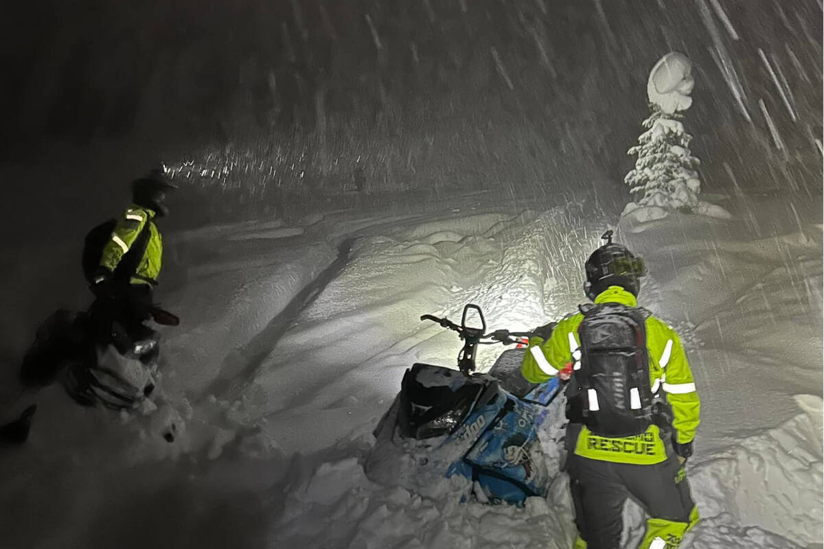 Vernon Search and Rescue, with help from the Hunters Range Snowmobile Association, brought to safety a pair of stranded snow bikers in a drainage ditch on Hunters Ranger near Enderby Saturday, Feb. 4. (Facebook photo)