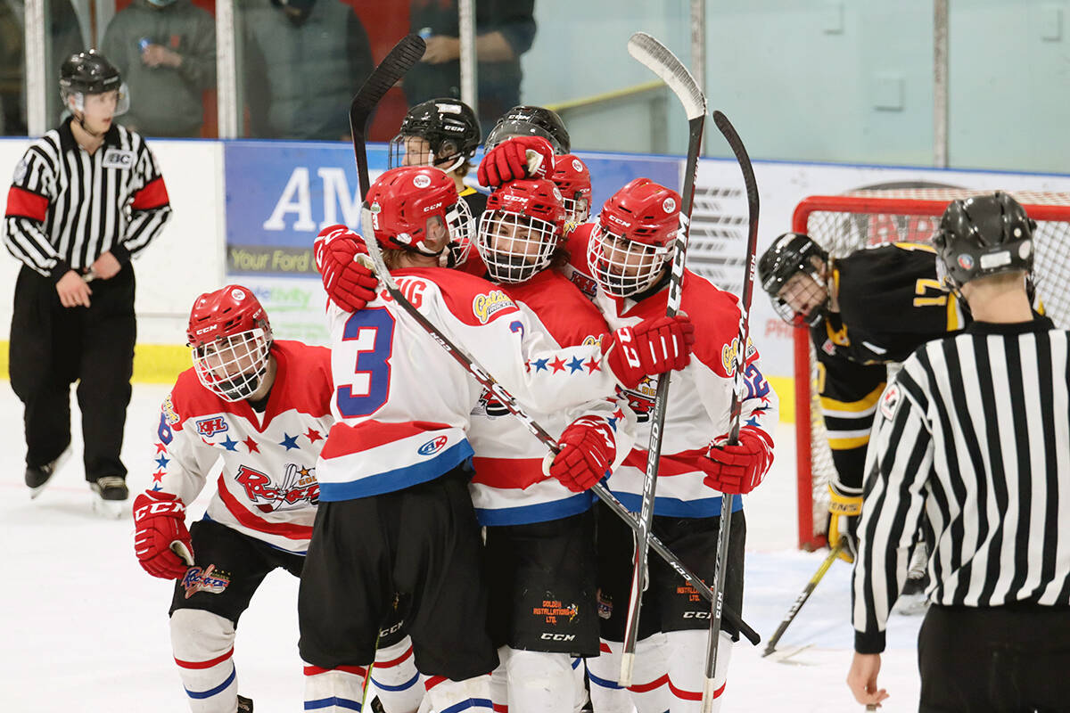 The Golden Rockets celebrating a last-second goal against the Grand Forks Border Bruins on Oct. 15. (Photo by Laurie Tritschler)