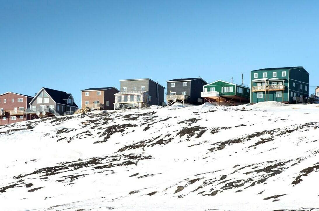 Houses are seen in Iqaluit, Nunavut, Saturday, April 25, 2015. A new Indigenous housing coalition is calling on the federal government to invest $6 billion in its upcoming budget to develop an urban, rural and northern Indigenous housing strategy and create Canada’s first national Indigenous housing centre. THE CANADIAN PRESS/Paul Chiasson