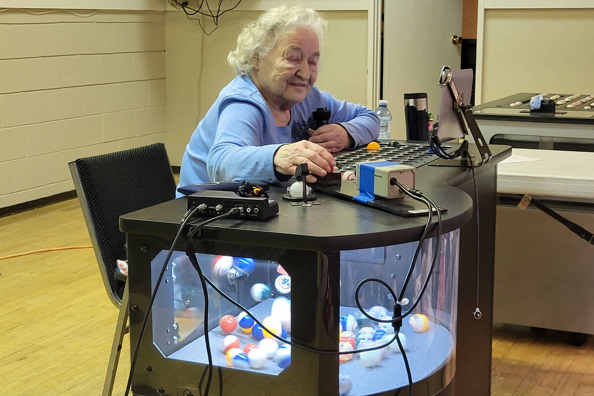 Mary Viala, 80, organizer of bingo at Vernon’s Halina Activity Centre, served as caller for the first session of the Vernon Winter Carnival Bingo Marathlon, Tuesday, Feb. 7, at the Halina Centre. (Roger Knox - Morning Star)