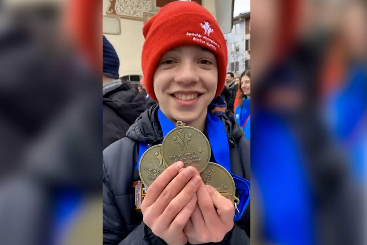 Revelstoke Special Olympics alpine skier Yorke Parkin holding his three gold medals from the 2023 Special Olympics BC Winter Games. (Contributed by Courtney Kaler)