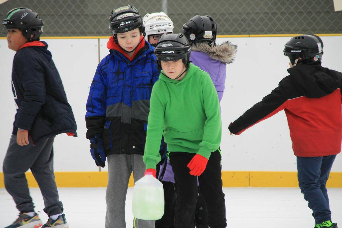 Throughout the week, students from different schools participate in the curling for two hours, on the Centennial Outdoor Rink (Bowen Assman/ Vernon Morning Star)