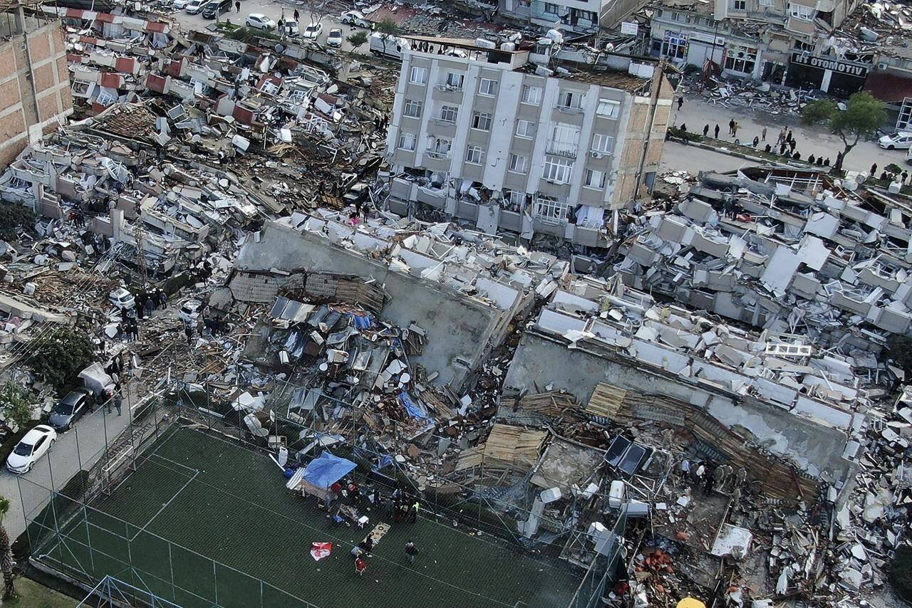 Aerial photo shows the destruction in Hatay city centre, southern Turkey, Tuesday, Feb. 7, 2023. Donations are pouring into a Vancouver warehouse for those affected by Monday’s devastating earthquake in Turkey but a volunteer organizer says the country could most benefit from professional search and rescues teams.THE CANADIAN PRESS/AP, IHA