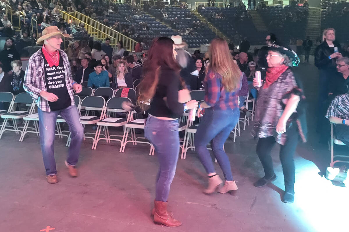 DJ Lunchboxx had concert-goers up dancing before and after the acts at the Vernon Winter Carnival A&W 2023 Snowglobe Country Barn Burner concert Friday, Feb. 10, at Kal Tire Place. (Roger Knox - Morning Star)