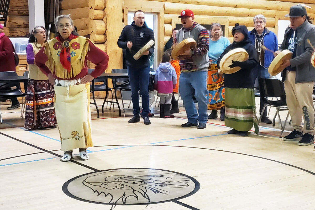 WLFN elder Jean William dances to the drumming song as guests after everyone had entered the Elizabeth Grouse Gym for a meal. (Monica Lamb-Yorski photo - Williams Lake Tribune)
