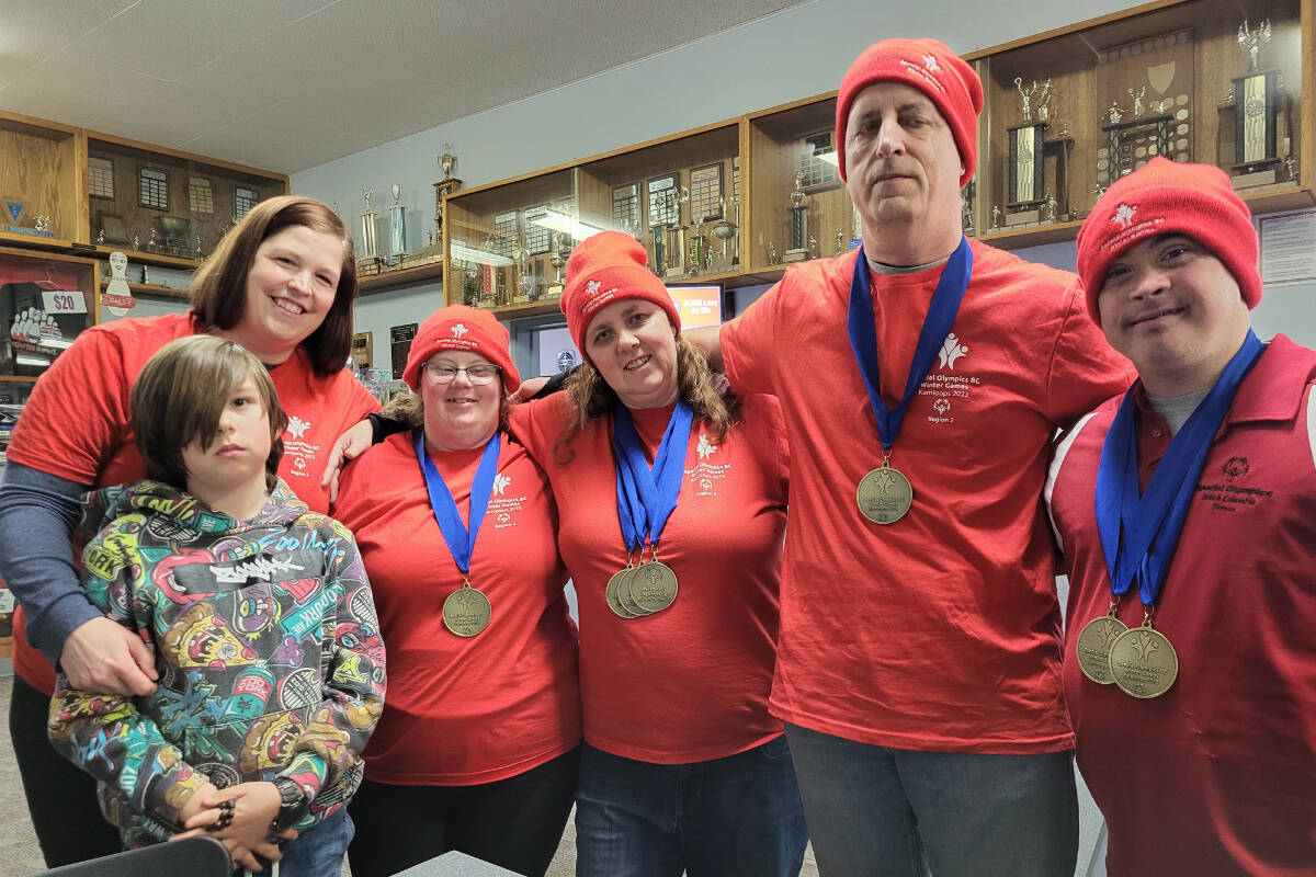 Vernon Special Olympics bowlers including assistant coach Krissy Krnasty (back, from left), Erin Murphy, Cheryl Bird, Jamie Potter and Steven Linemayr, with team mascot Jaden Graham (front, left), won team gold at the Special Olympics B.C. Games in Kamloops (teammate Katelyn Oliver is missing from photo). Bird won two individual gold medals while Linemayr added another. (Roger Knox - Morning Star)