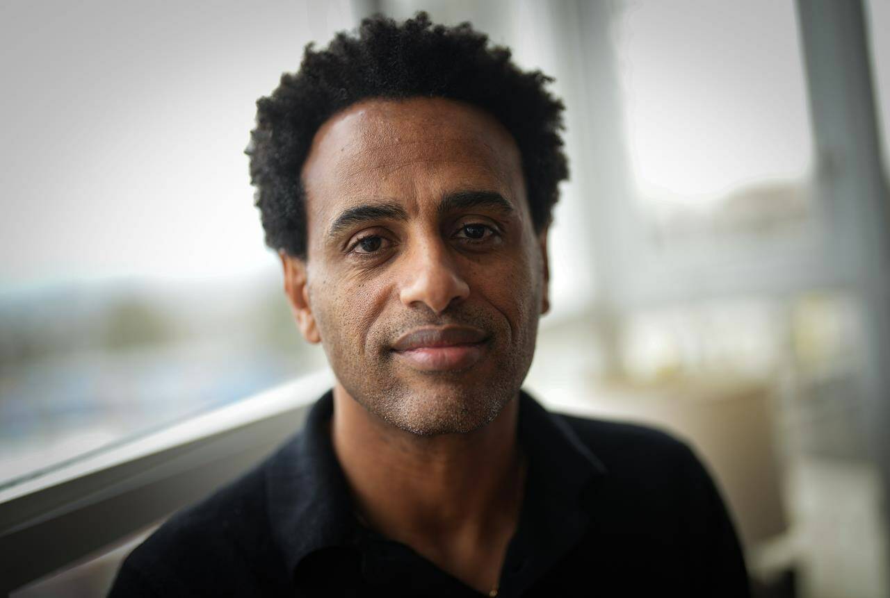 Deress Asghedom, who has been shortlisted for a $25,000 prize in a national contest for Black entrepreneurs, poses for a photograph at his home in Vancouver on Wednesday, Feb. 15, 2023. THE CANADIAN PRESS/Darryl Dyck
