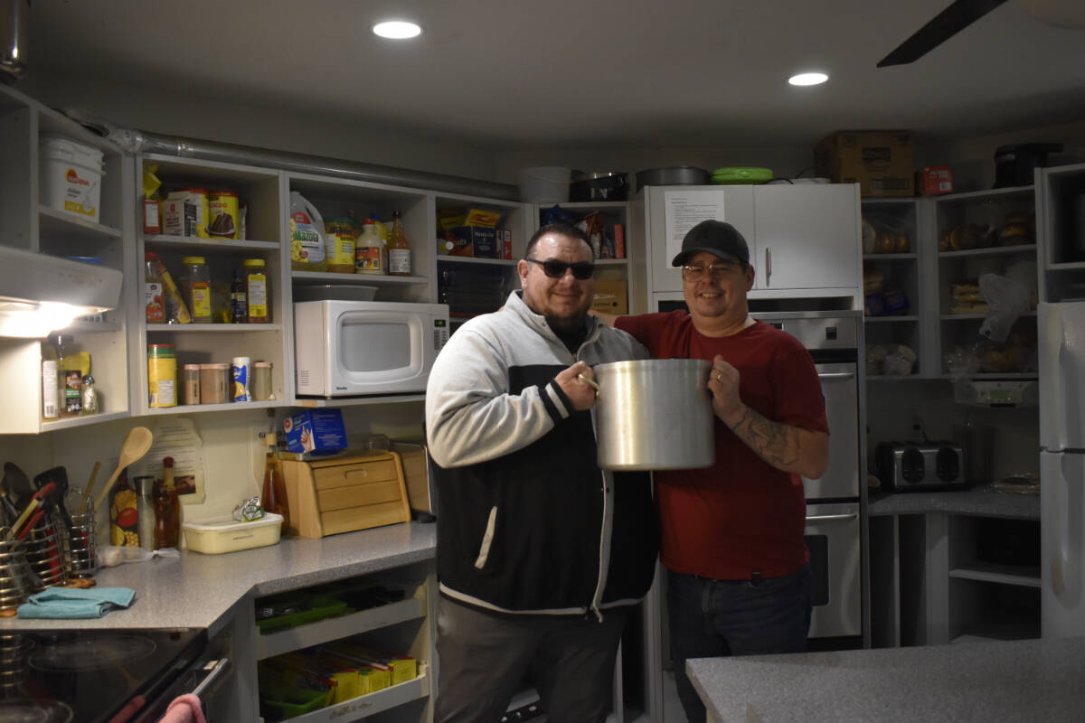 Chester Demchuk (left) and Ryan Davis (right) are among the clients at Penticton’s Discovery House who have spent weeks cooking for the annual Soup is Good Food fundraiser. (Logan Lockhart, Western News)