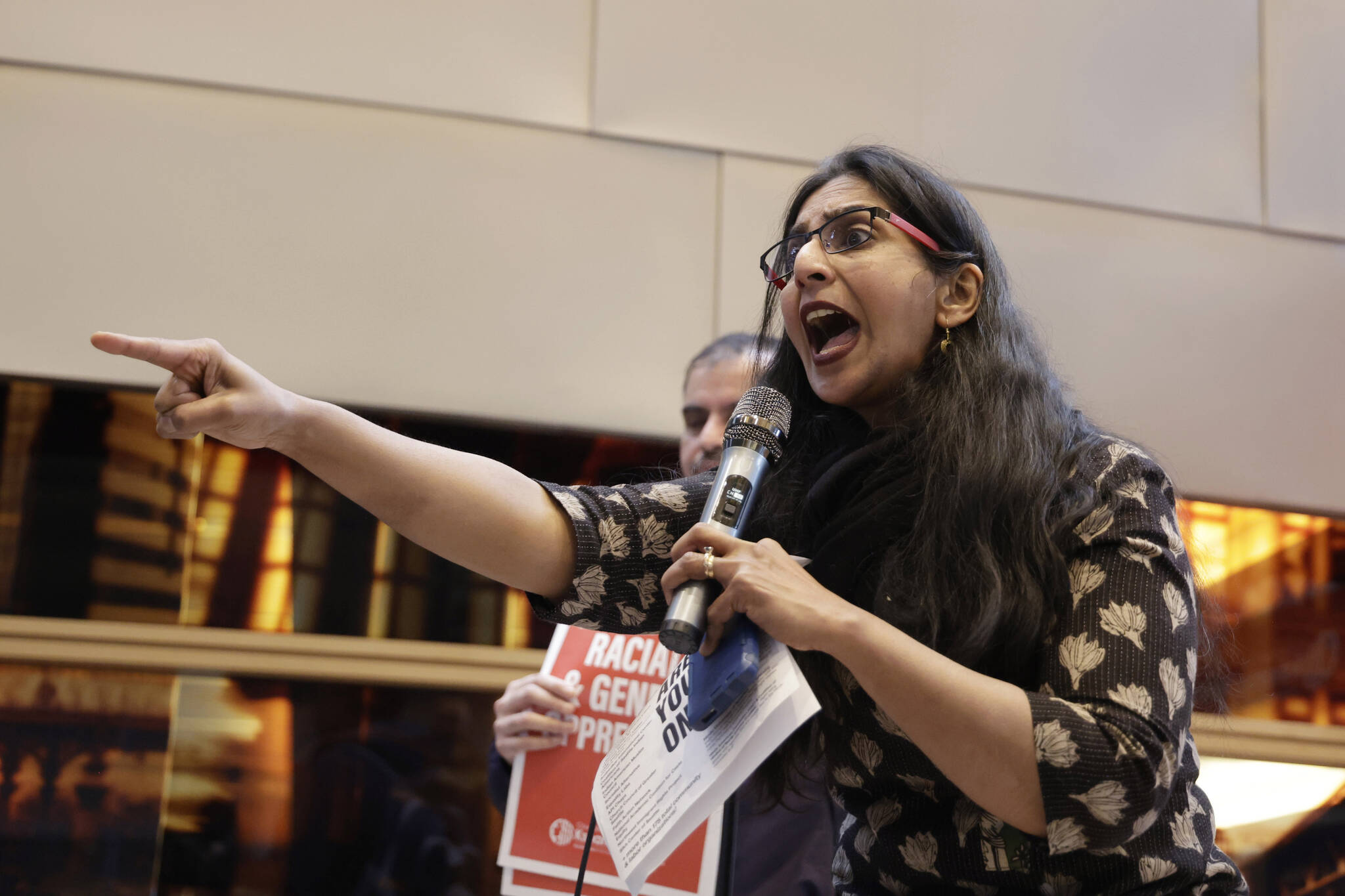 Seattle Council Member Kshama Sawant speaks to supporters and opponents of a proposed ordinance to add caste to Seattle’s anti-discrimination laws at a rally at Seattle City Hall, Tuesday, Feb. 21, 2023, in Seattle. Sawant proposed the ordinance. (AP Photo/John Froschauer)