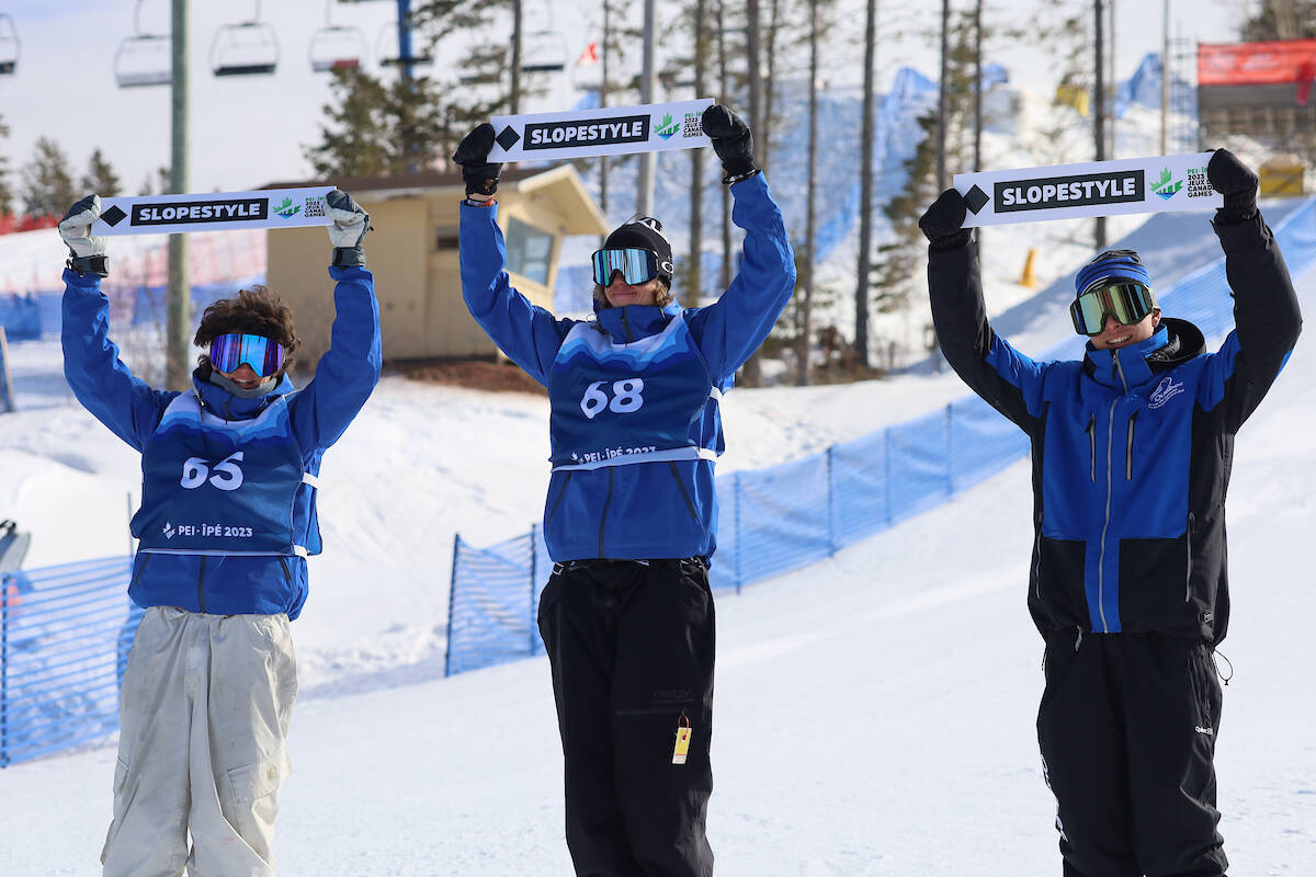 Vernon’s Tate Garrod (centre) celebrates his gold-medal win at the Canada Winter Games in PEI with B.C. teammate and silver medalist Adam Mulvihill of Squamish (left) and Jeremy Gagné of Quebec, who won bronze. (David Keenan Photo)