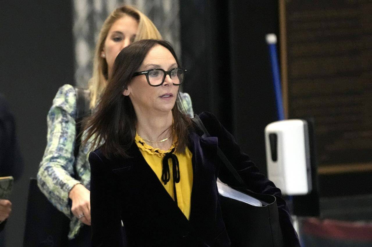 Attorneys for R. Kelly, Jennifer Bonjean, right, and Ashley Cohen arrive at the Dirksen Federal Building for Kelly’s sentencing hearing Thursday, Feb. 23, 2023, in Chicago. (AP Photo/Charles Rex Arbogast)