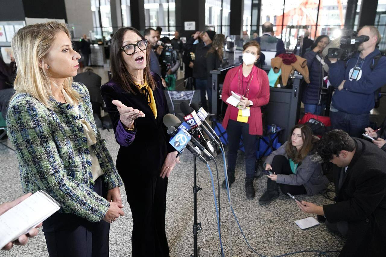 Attorneys for R. Kelly, Jennifer Bonjean, right, and Ashley Cohen talk to reporters at the Dirksen Federal Building after Kelly’s sentencing hearing Thursday, Feb. 23, 2023, in Chicago. R. Kelly was sentenced on Thursday to 20 years in prison for child pornography and enticement of minors for sex but will serve all but one of those simultaneously with a 30-year sentence on racketeering and sex trafficking convictions. (AP Photo/Charles Rex Arbogast)