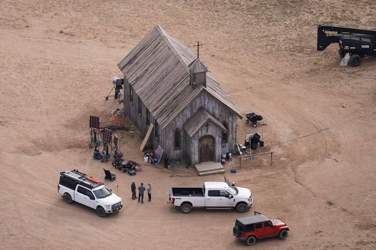 FILE - This aerial photo shows the movie set of “Rust” at Bonanza Creek Ranch in Santa Fe, N.M., on Oct. 23, 2021. Prosecutors have dropped the possibility of a sentence enhancement that could have carried a mandatory five-year sentence against Alec Baldwin in the fatal film-set shooting, according to new court filings made public Monday, Feb. 20, 2023. (AP Photo/Jae C. Hong, File)
