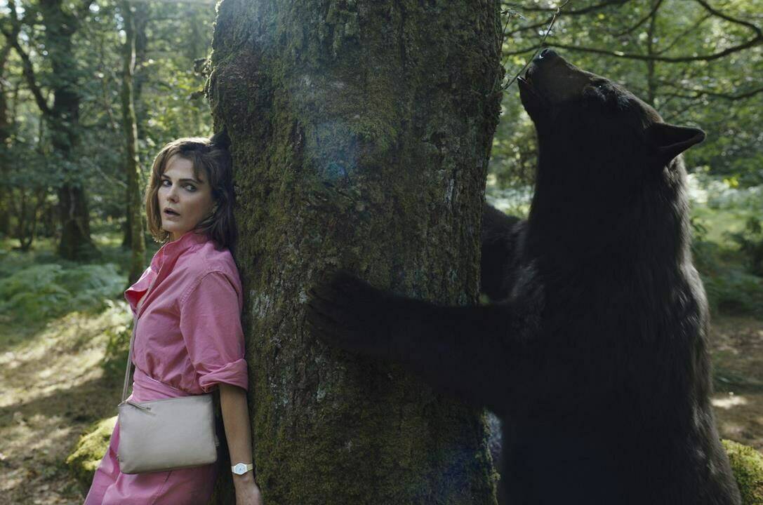 This image released by Universal Pictures shows Keri Russell in a scene from “Cocaine Bear,” directed by Elizabeth Banks. (Pat Redmond/Universal Pictures via AP)