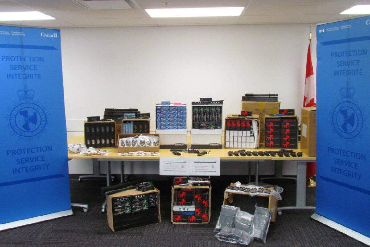 A Chilliwack man is facing criminal code and customs act charges after being found in possession of, and importing from China, more than 1,350 prohibited weapons and 13 conducted energy weapons in January 2023. (CBSA photo)
