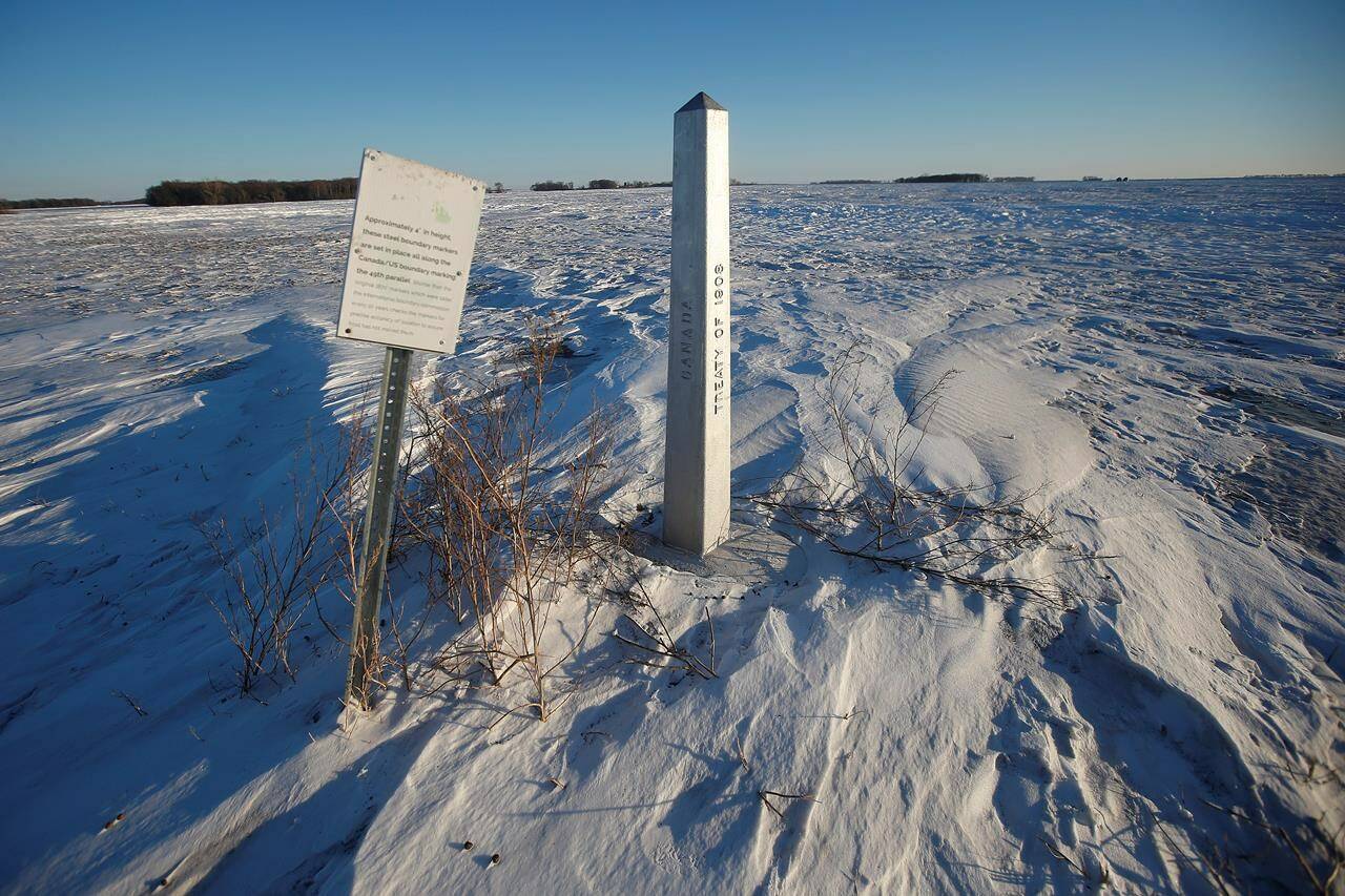 A border marker is shown just outside of Emerson, Man., Thursday, Jan. 20, 2022. A group of Republicans on Capitol Hill is turning its gaze towards Canada as it ramps up political criticism of President Joe Biden’s immigration strategy. THE CANADIAN PRESS/John Woods
