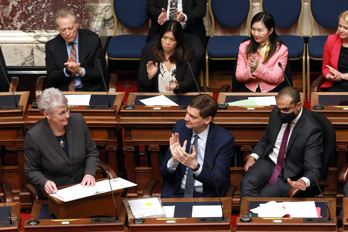 Minister of Finance Katrine Conroy tables her first budget in the legislative assembly at legislature in Victoria, Tuesday, Feb. 28, 2023. THE CANADIAN PRESS/Chad Hipolito