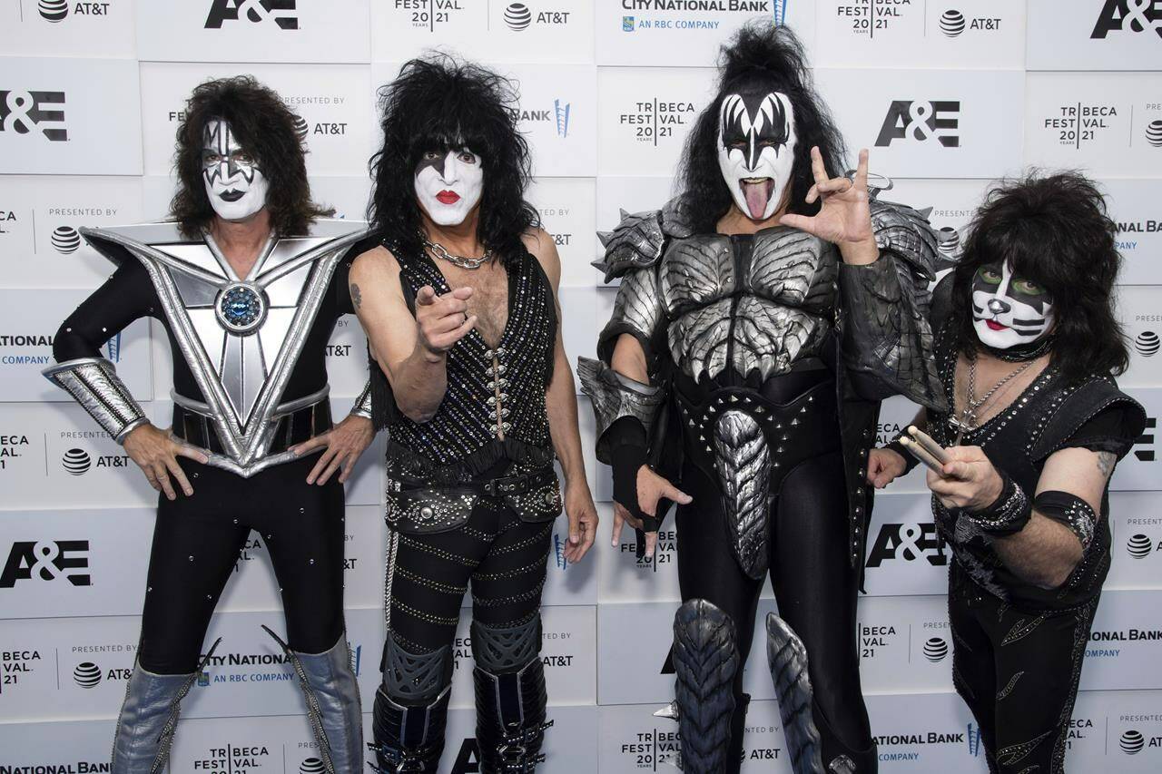 FILE - Members of the band Kiss, from left, Tommy Thayer, Paul Stanley, Gene Simmons and Eric Singer attend the premiere of A&E Network’s “Biography: KISStory” in New York on June 11, 2021. Kiss have announced the final shows of their last tour, planning to hang up their platform boots after two back-to-back shows at Madison Square Garden in New York at the end of 2023. (Photo by Charles Sykes/Invision/AP, File)