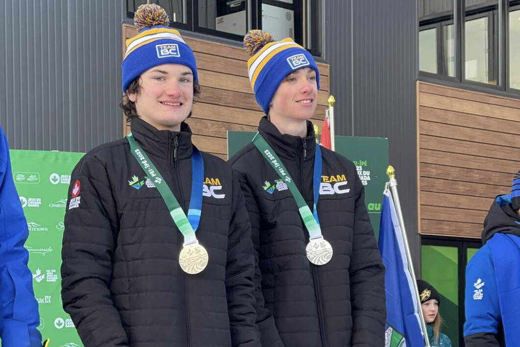 Lumby’s Matthew Leach, right, and guide Chase Ferguson of Vernon celebrate their silver medal in men’s Para-Alpine Skiing’s super giant slalom race Wednesday, March 1, at the Canada Winter Games in Prince Edward Island. (Facebook photo)