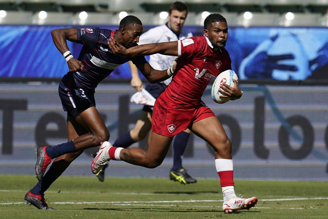 United States’ David Still attempts to tackle Canada’s Josiah Morra during their Los Angeles rugby sevens series pool match at Dignity Health Sports Park in Carson, Calif., Saturday, Aug. 27, 2022. The Canadian men hope playing before a hometown crowd at this weekend’s HSBC World Rugby Sevens Series event can help pull them back from the abyss. THE CANADIAN PRESS/AP-Marcio Jose Sanchez