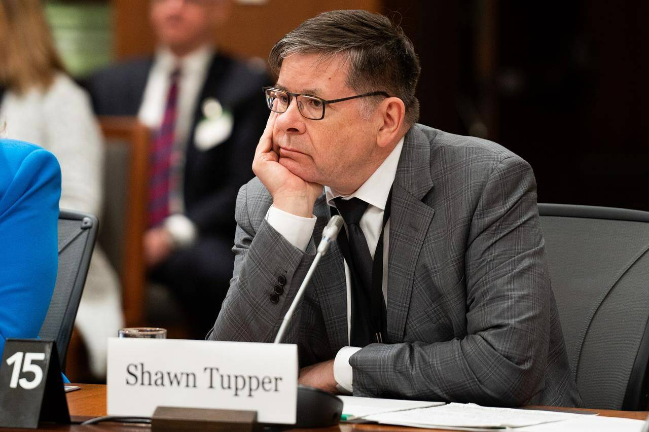 Shawn Tupper, Deputy Minister of the Department of Public Safety and Emergency Preparedness waits to appear as a witness at the Standing Committee on Procedure and House Affairs (PROC) regarding foreign election interference on Parliament Hill in Ottawa, on Wednesday, March 1, 2023. THE CANADIAN PRESS/Spencer Colby