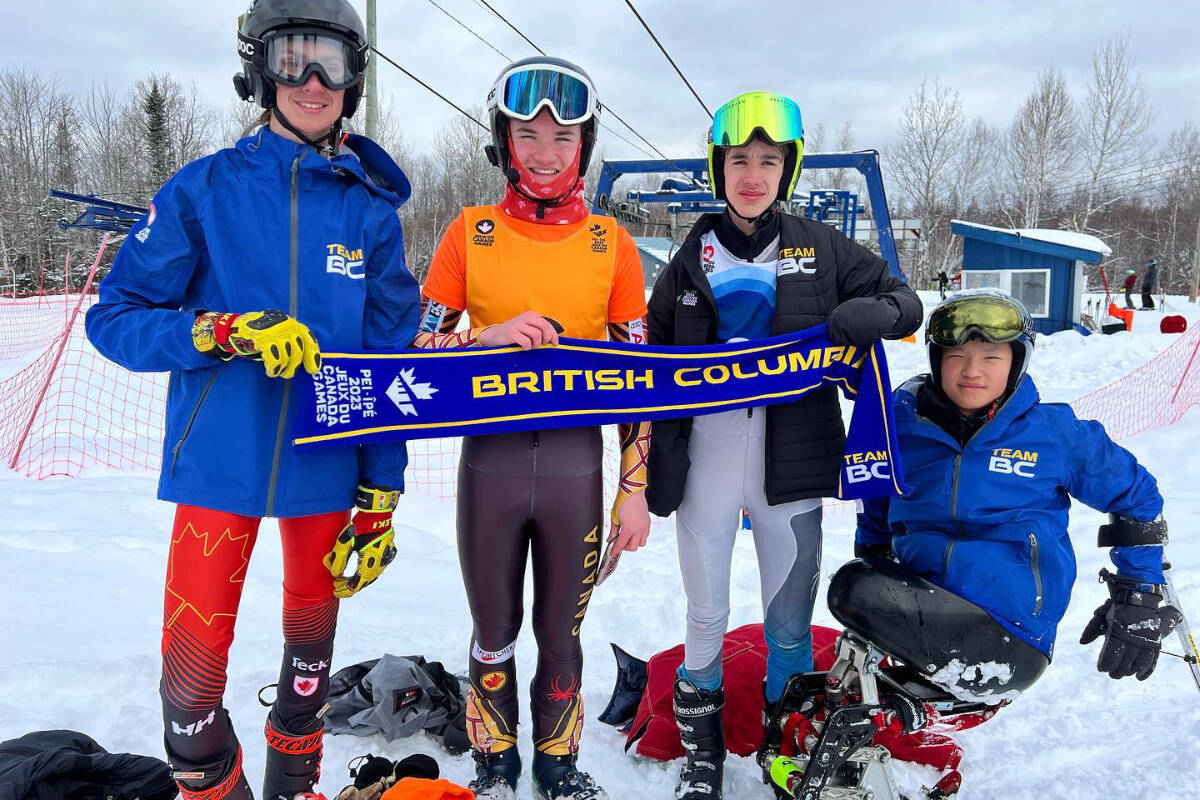 Lumby’s Michael Leach (left) and guide Chase Ferguson of Vernon (second from left) won gold in Para-Alpine Skiing’s men’s slalom race Thursday at the Canada Winter Games. West Kelowna’s Samuel Peters (right) was fourth and Ronan Wiens of Salmon Arm (second from right) was sixth. The event was held at Crabbe Mountaiin Ski Resort in New Brunswick. (Facebook photo)