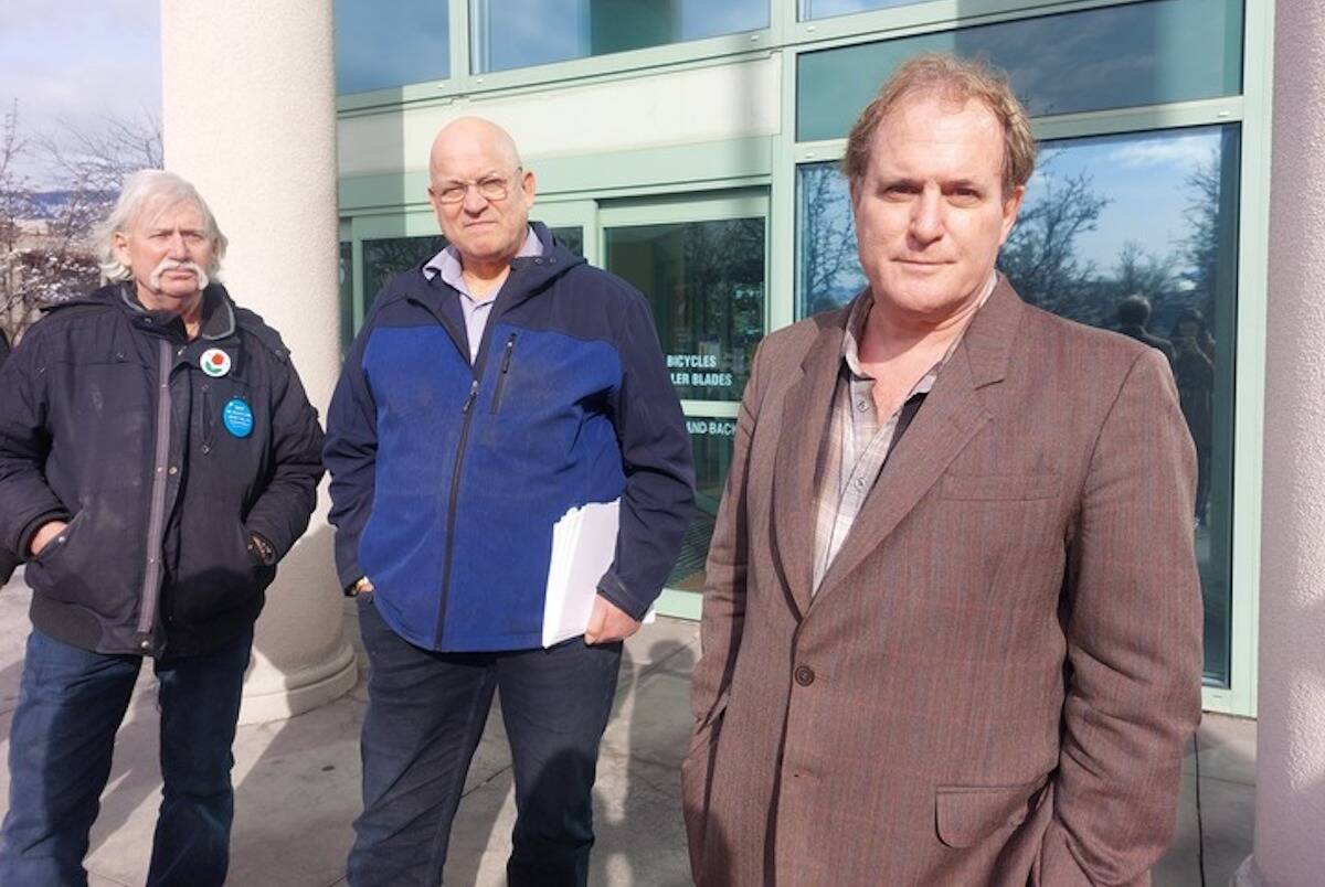 David Lindsay (right) and two of his supporters outside the Kelowna Courthouse on March. 1. (Jacqueline Gelineau/Capital News)