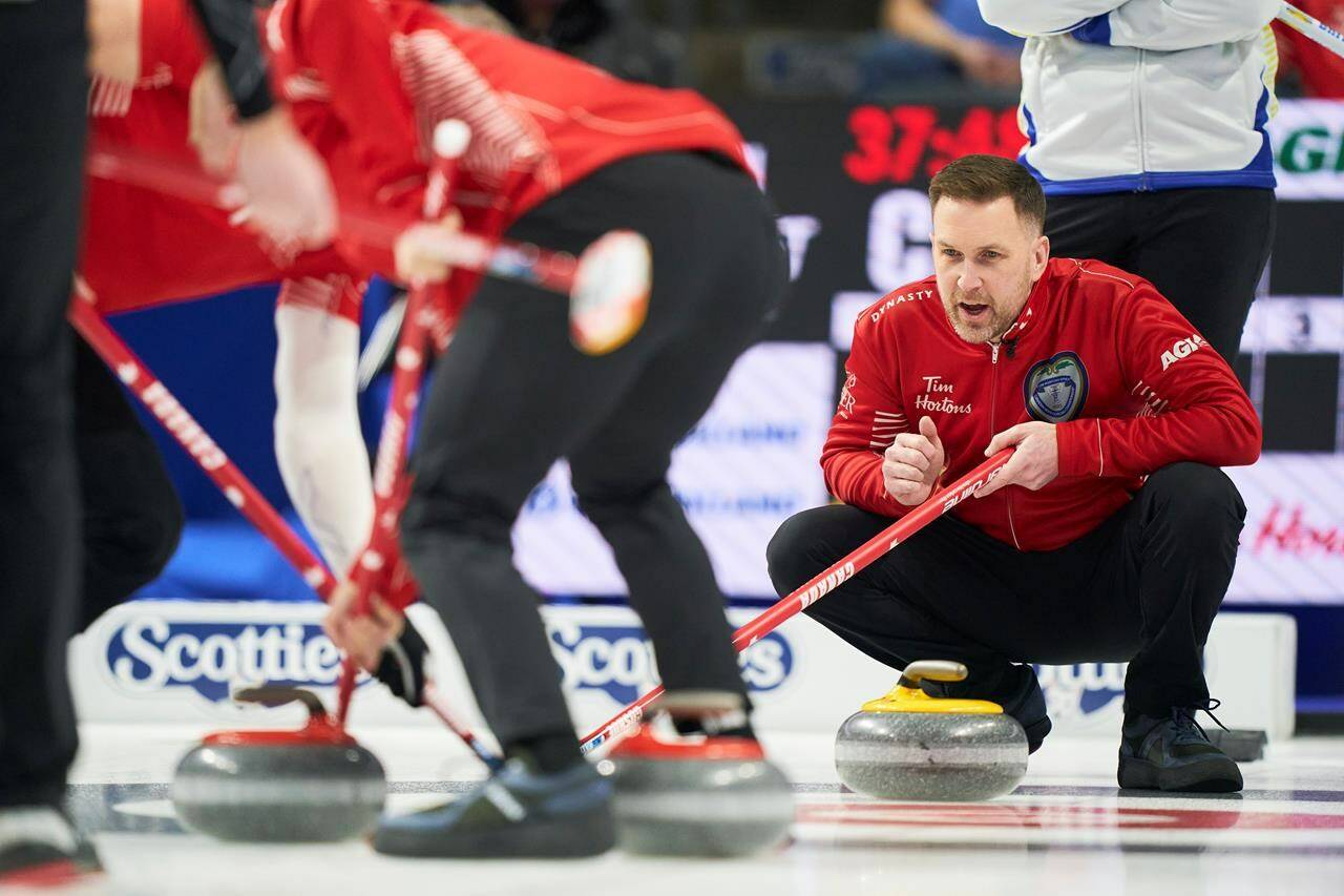 Team Canada skip Brad Gushue yells instructions to the sweepers during Canada’s first draw against British Columbia at the 2023 Tim Hortons Brier at Budweiser Gardens in London, Ont. on Friday, March 3, 2023. THE CANADIAN PRESS/ Geoff Robins
