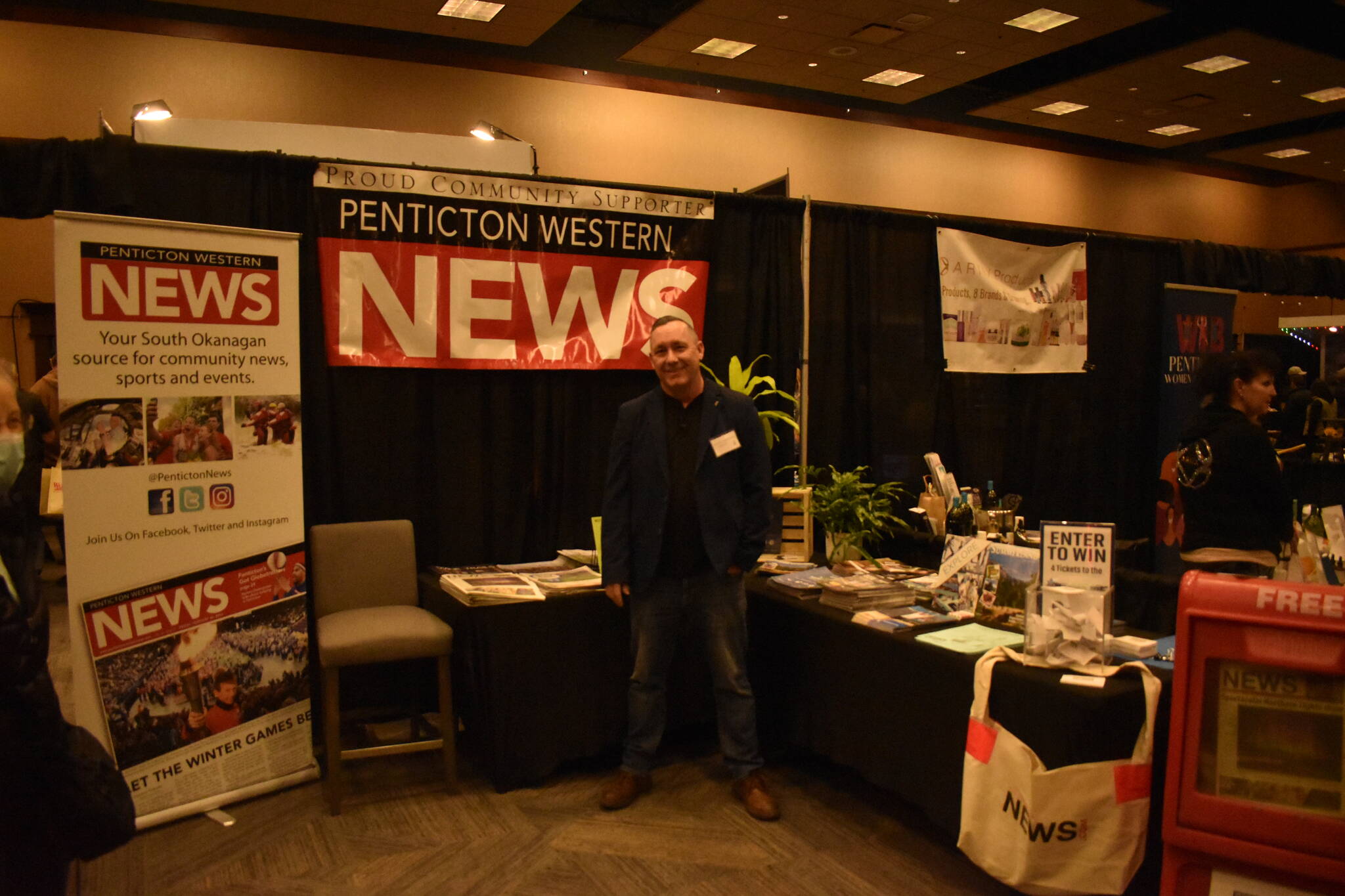 Warren Smith, the publisher of the Penticton Western News, at the Western News’ booth at the 27th annual Penticton Home and Reno Show on Saturday, March 4.
