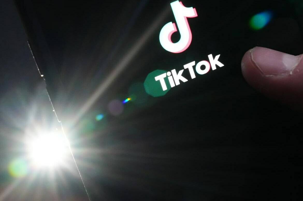 The TikTok startup page is displayed on an iPhone in Ottawa on Monday, Feb. 27, 2023. The Broadbent Institute is keeping TikTok as a sponsor during their upcoming conference, despite rising national security concerns from the government of Canada regarding the popular app. THE CANADIAN PRESS/Sean Kilpatrick