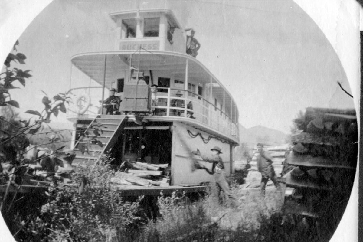 This historic photo is of Mr. C.E. Wells who ran a sawmill at Palliser, just 21 km east of Golden on the banks of the Kicking Horse River. Among his many friends was Francis Armstrong the owner of the Columbia River riverboat called the Duchess. The photo of the boat shows the steamer Duchess tied up along the river where men were loading wood on to fuel the engine.

~Golden Museum and Archives