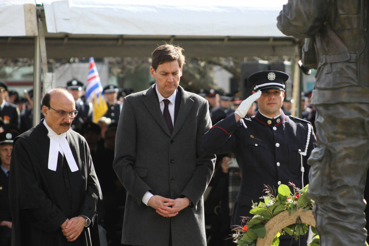Speaker of the Legislative Assembly Raj Chouhan (left) and Premier David Eby pay their respects to British Columbia’s fallen fire fighters at the south lawn of the legislative assembly in Victoria Monday (March 6). (Austin Westphal/News Staff)