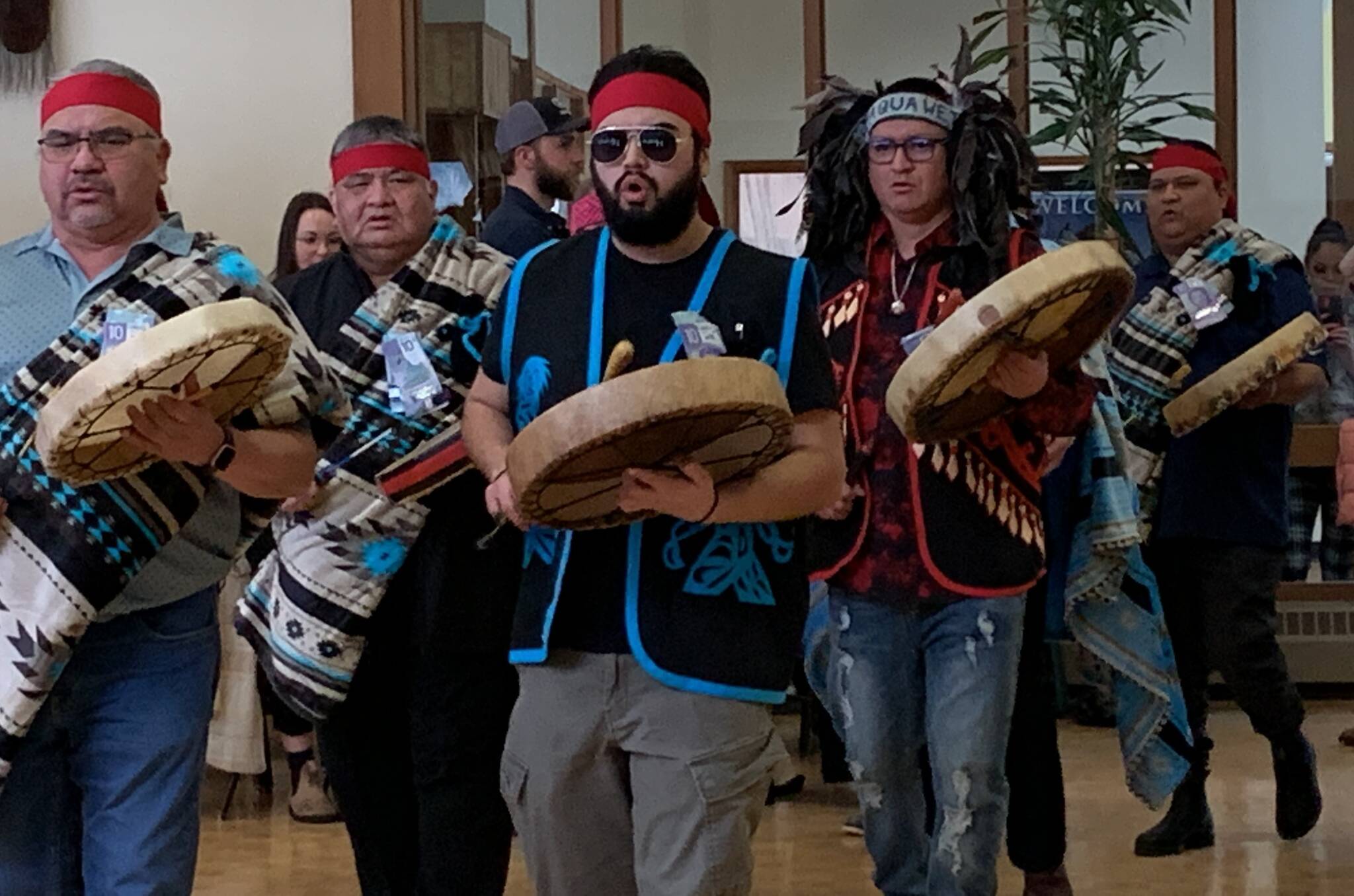 Drummers sing as they walk into the Sts’ailes Lhawathet Lalem (Healing House) on Friday, March 3. (Adam Louis/Observer)