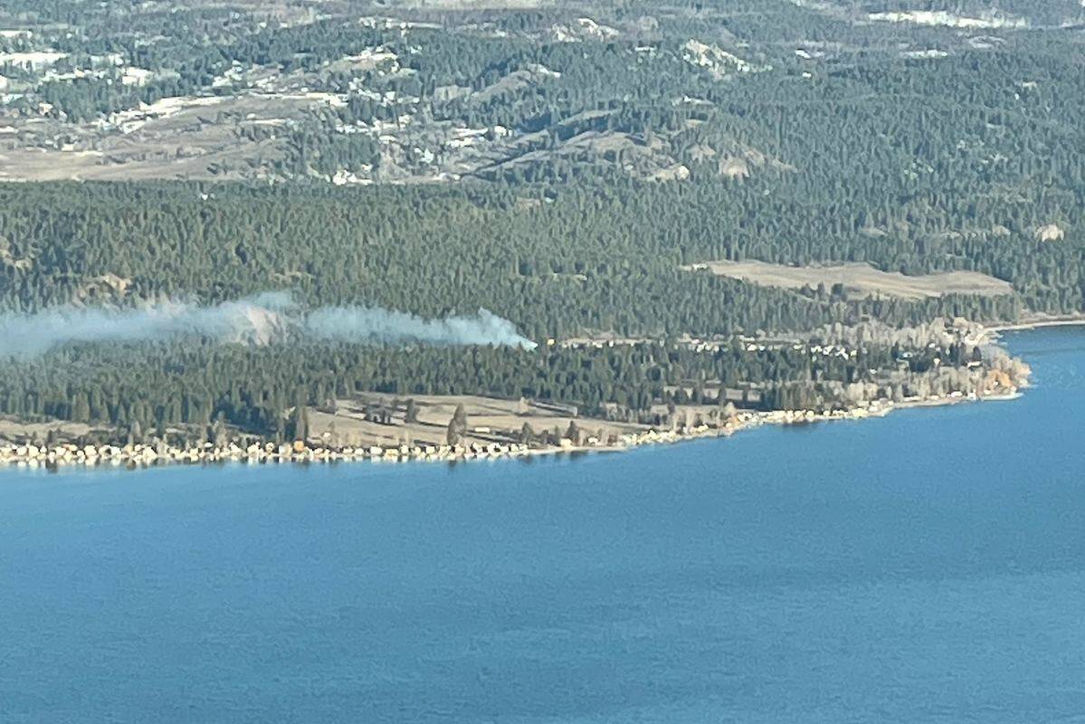 Smoke can be seen from Sparkling Hill Resort and Spa on the other side of Okanagan Lake. (Gary Barnes/Capital News)