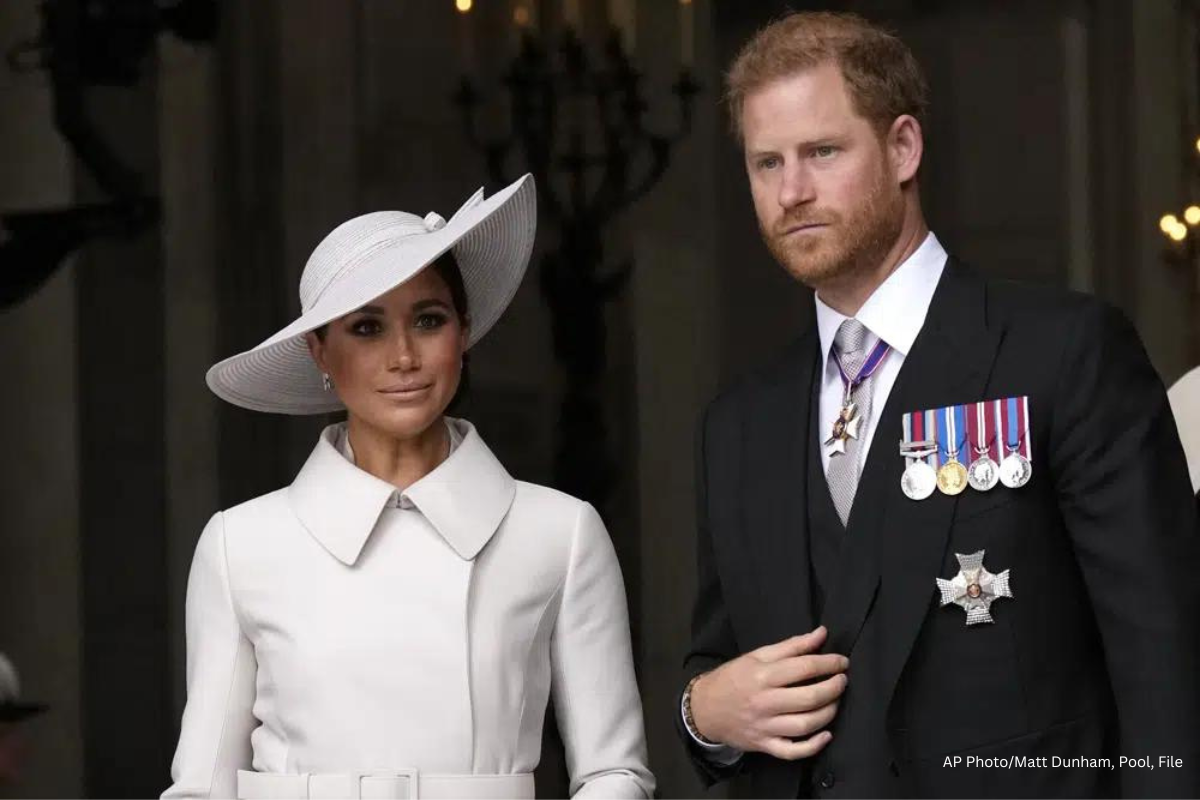 Prince Harry and Meghan Markle, Duke and Duchess of Sussex leave after a service of thanksgiving for the reign of Queen Elizabeth II at St Paul's Cathedral in London, Friday, June 3, 2022 on the second of four days of celebrations to mark the Platinum Jubilee. Prince Harry and his wife Meghan announced Wednesday, March 8, 2023 that their daughter had been christened in a private ceremony in California, publicly calling her a princess and revealing for the first time that they will use royal titles for their children. (AP Photo/Matt Dunham, Pool, File)