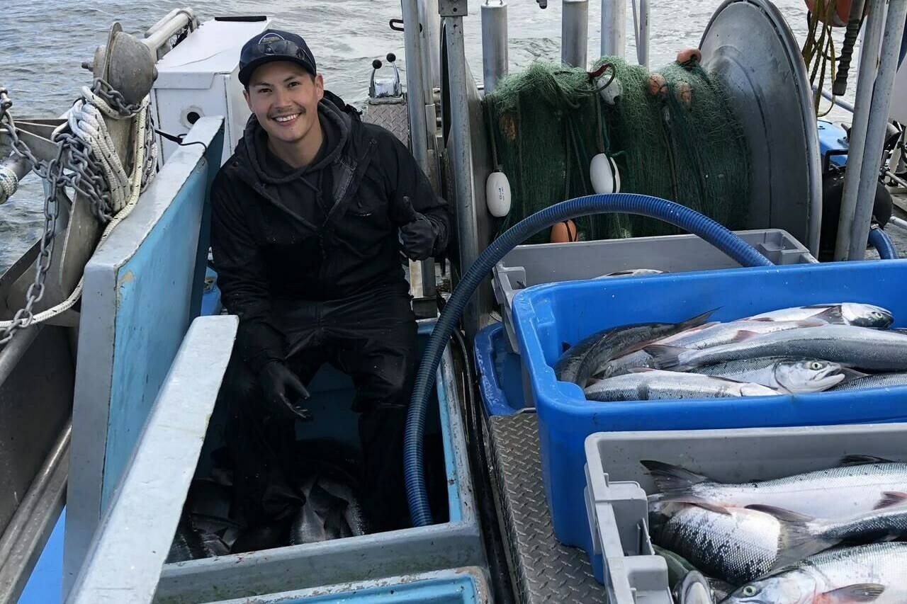 Kris Dudoward is shown aboard the commercial fishing vessel Irenda earlier this week with catch of sockeye salmon on B.C.���s Skeena River near Prince Rupert. The union representing commercial fisheries, the United Fisherman Allied Workers filed a petition on Feb. 22 requesting the end of foreign ownership of fishing licences and quotas on the BC coast. File - THE CANADIAN PRESS/HO-Mitch Dudoward **MANDATORY CREDIT**