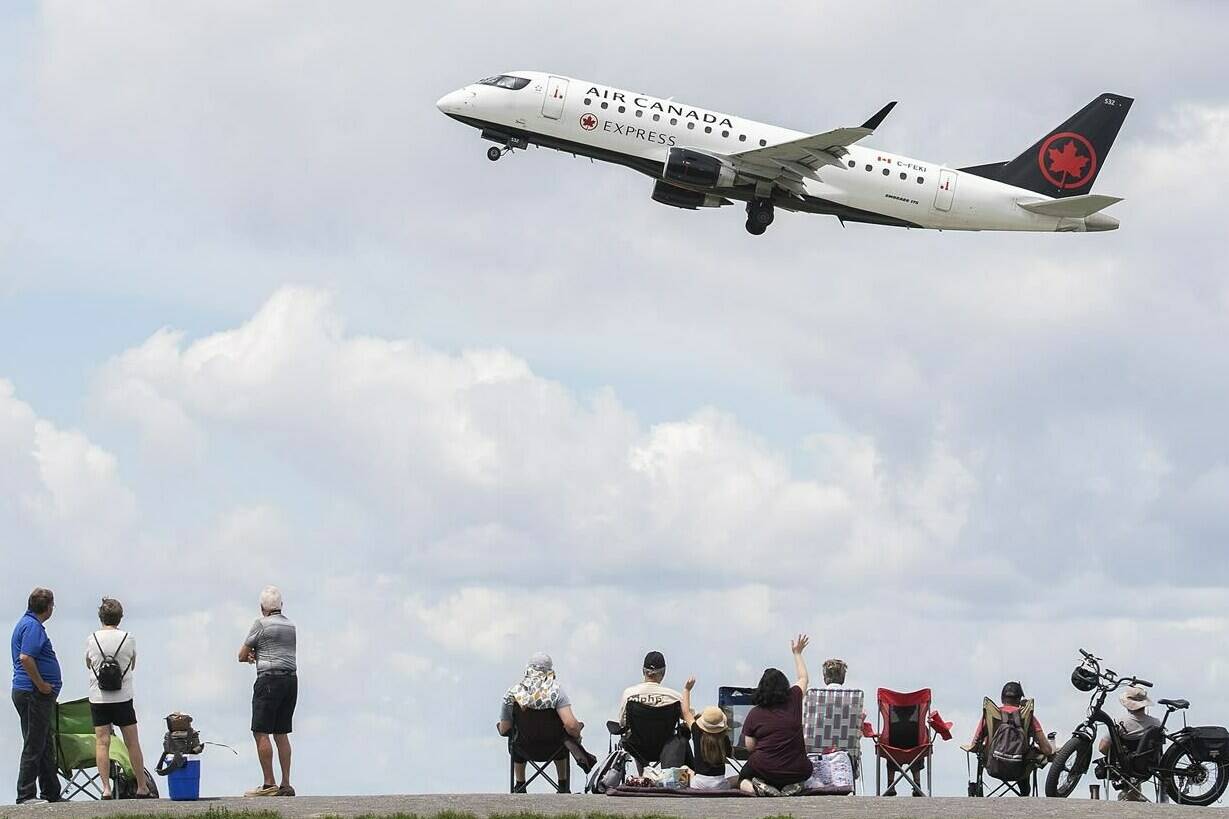 An Air Canada jet takes off from Trudeau Airport in Montreal, Thursday, June 30, 2022. Passenger numbers are finally approaching pre-pandemic levels after Canadians emerged blinking from COVID-19 confinement last year. THE CANADIAN PRESS/Graham Hughes